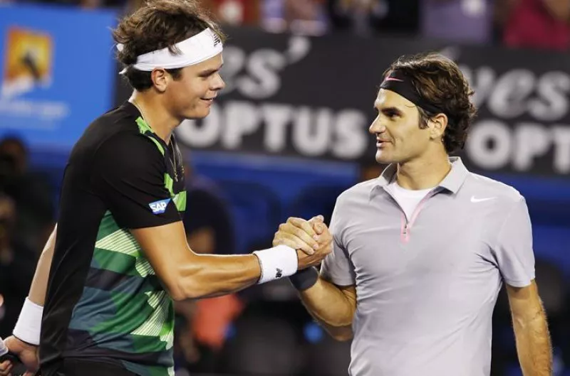 Federer y Raoinic. Foto: EFE