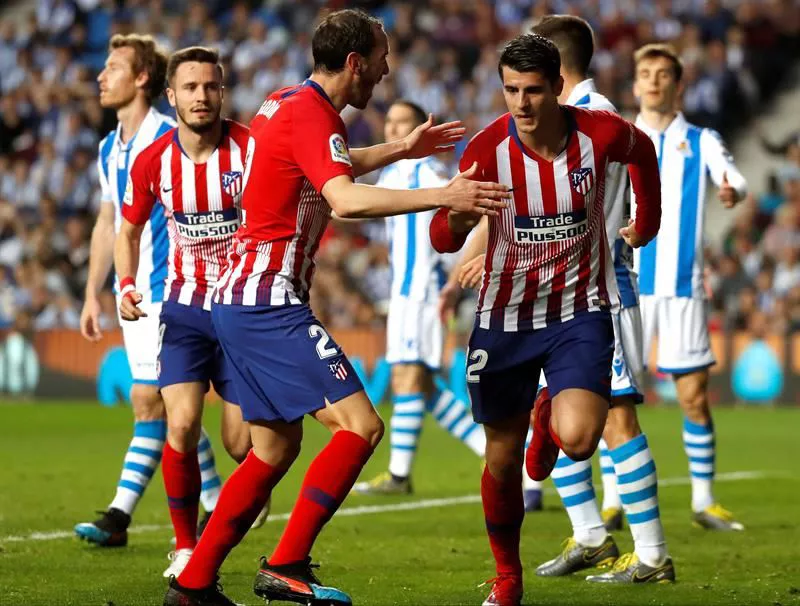 Morata celebra uno de sus dos goles a la Real Sociedad