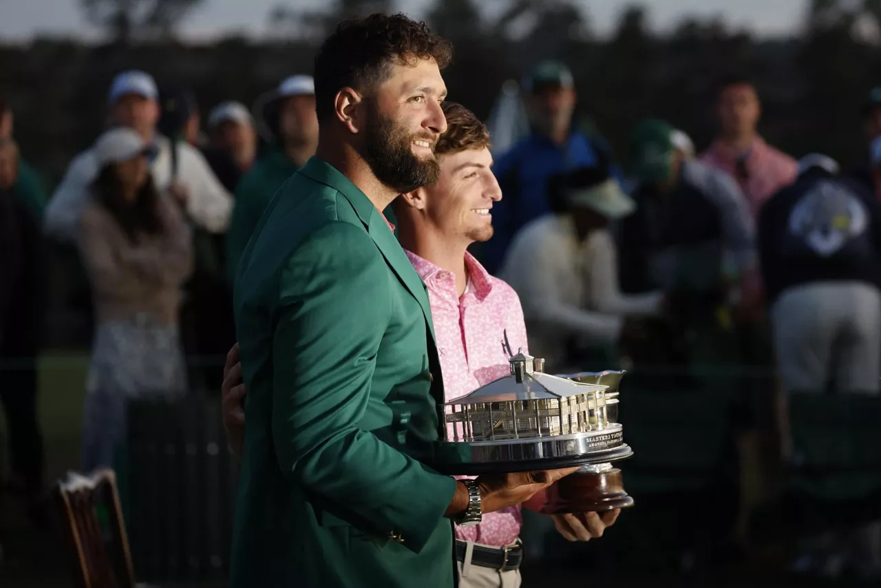 Rahm, Sam Bennett golf jokalariarekin. Argazkia: EFE. 