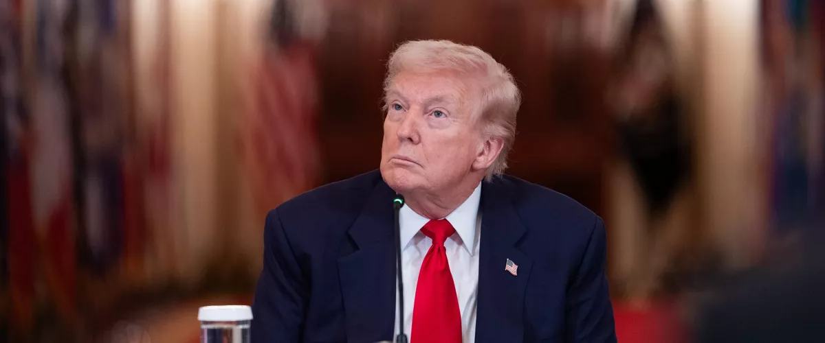 WASHINGTON (United States), 06/03/2026.- US President Donald Trump looks on during a 'Saving College Sports' roundtable in the East Room of the White House in Washington, DC, USA, 06 March 2026. A new council that will explore ways to overhaul college sports is expected to discuss a potential antitrust exemption, a policy change the National Collegiate Athletic Association has sought to protect itself from legal challenges to player compensation rules. EFE/EPA/AARON SCHWARTZ / POOL
