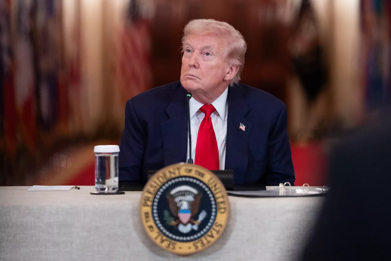 WASHINGTON (United States), 06/03/2026.- US President Donald Trump looks on during a 'Saving College Sports' roundtable in the East Room of the White House in Washington, DC, USA, 06 March 2026. A new council that will explore ways to overhaul college sports is expected to discuss a potential antitrust exemption, a policy change the National Collegiate Athletic Association has sought to protect itself from legal challenges to player compensation rules. EFE/EPA/AARON SCHWARTZ / POOL
