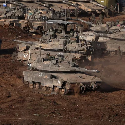 - (Israel), 12/03/2026.- Israeli tanks at a gathering site along the Israel-Lebanon border, 12 March 2026. The Israeli military stated it is conducting strikes across Lebanon targeting Hezbollah infrastructure and personnel. (Líbano, Hizbulá/Hezbolá) EFE/EPA/ATEF SAFADI
