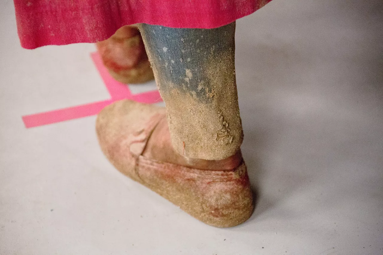 Testing to get the right amount of sand on the shoe. He migrants talk about sand being everywhere and in everything.