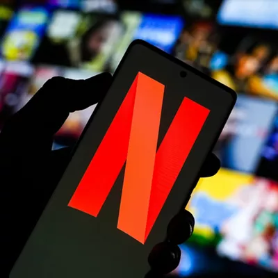 July 4, 2025, Ahmedabad, Gujarat, India: In this photo illustration, the Netflix logo is prominently displayed on a smartphone screen, while the Netflix brand and streaming interface appears in the background.,Image: 1018568222, License: Rights-managed, Restrictions: , Model Release: no, Credit line: Saurabh Sirohiya / Zuma Press / ContactoPhoto