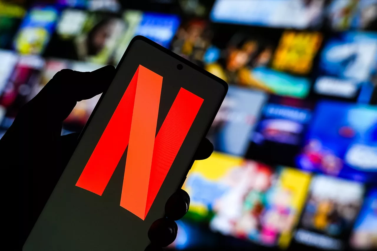 July 4, 2025, Ahmedabad, Gujarat, India: In this photo illustration, the Netflix logo is prominently displayed on a smartphone screen, while the Netflix brand and streaming interface appears in the background.,Image: 1018568222, License: Rights-managed, Restrictions: , Model Release: no, Credit line: Saurabh Sirohiya / Zuma Press / ContactoPhoto