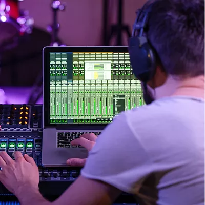 Digital mixer in a recording Studio , with a computer for recording music. On the background of the sound engineer at work. The concept of creativity and show business.
