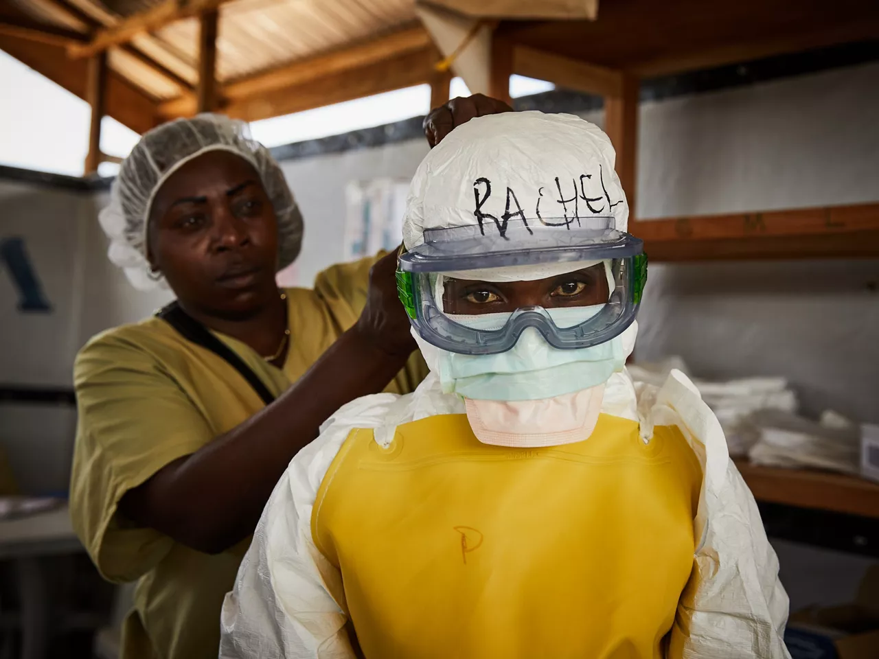 BENI (Congo, the Democratic Republic of the), 12/05/2026.- (FILE) - Rachel Rukwati suits up in PPE to enter a high-risk treatment zone, at the peak of the Ebola crisis, at a health centre in Beni, North Kivu, Democratic Republic of Congo, 04 May 2019 (reissued 12 May 2026). International Nurses Day (IND) is celebrated annually on 12 May to mark the birth of Florence Nightingale, founder of modern nursing. The day honours the vital contributions nurses make to global healthcare and societies. (Florencia) EFE/EPA/HUGH KINSELLA CUNNINGHAM
